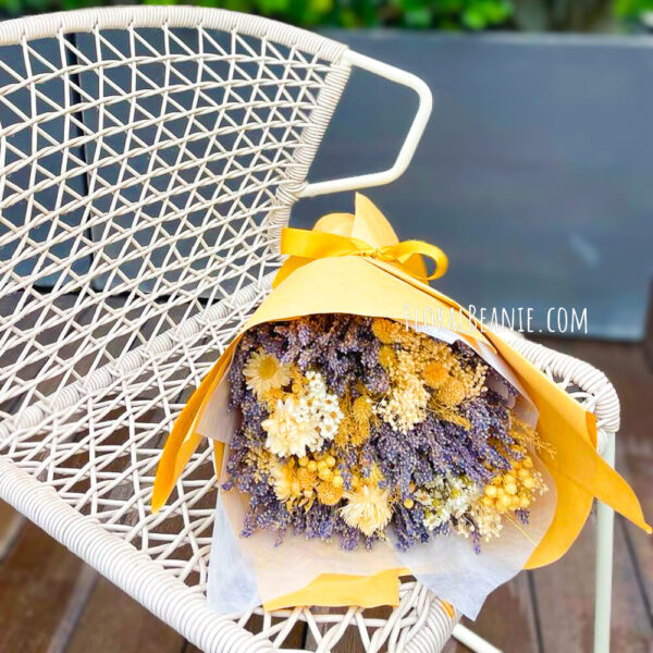 Lavender and Dried Flowers Bouquet Resting on Chair