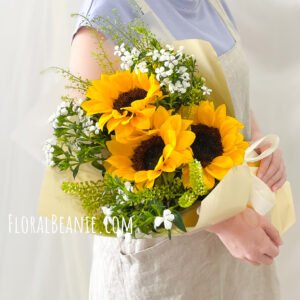 The Significance of Roses in Funeral Services in Singapore 58 Grande Sunflower and Greens Bouquet